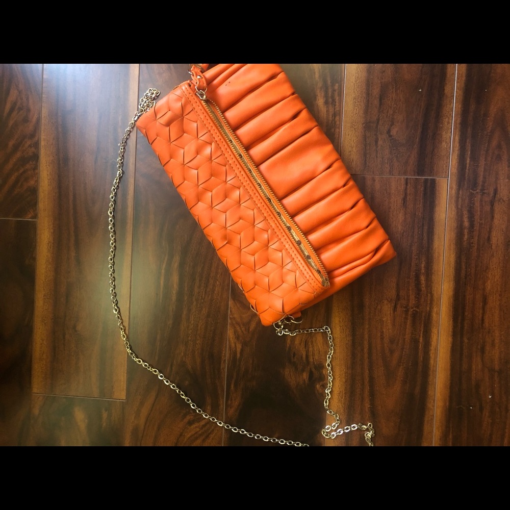 Orange clutch and crossbody bag